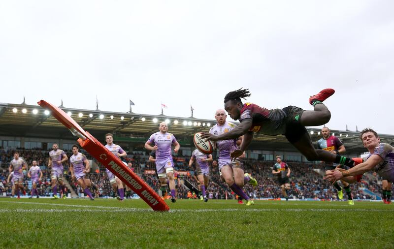 Gabriel Ibitoye of Harlequins dives over to score a try during the semi-final of the Premiership Rugby Cup against Exeter Chiefs at Sandy Park, on Sunday, February 2. Harlequins won the match 49-22. Getty
