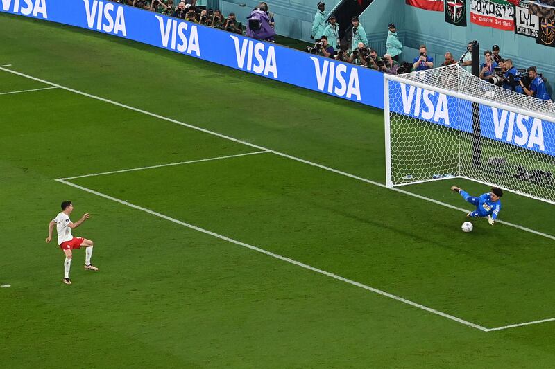 Mexico goalkeeper Guillermo Ochoa saves Robert Lewandowski's penalty. AFP