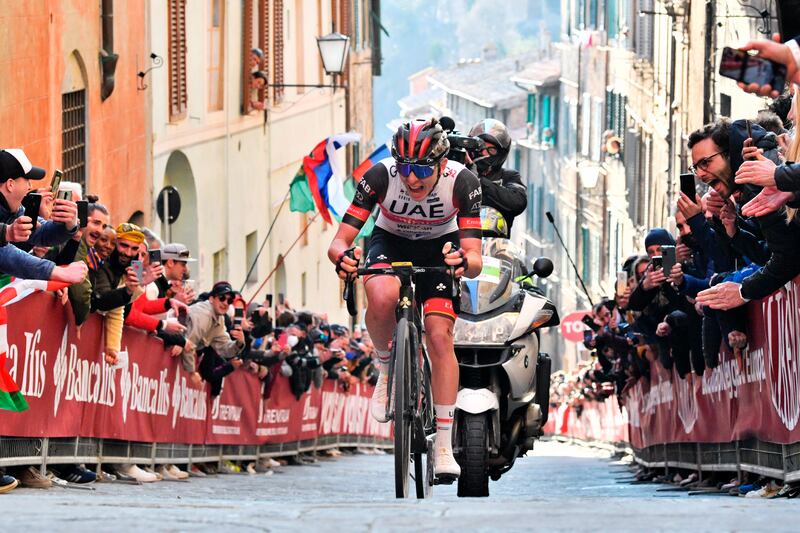 Tadej Pogacar pedals on his way to win the Strade Bianche. AP