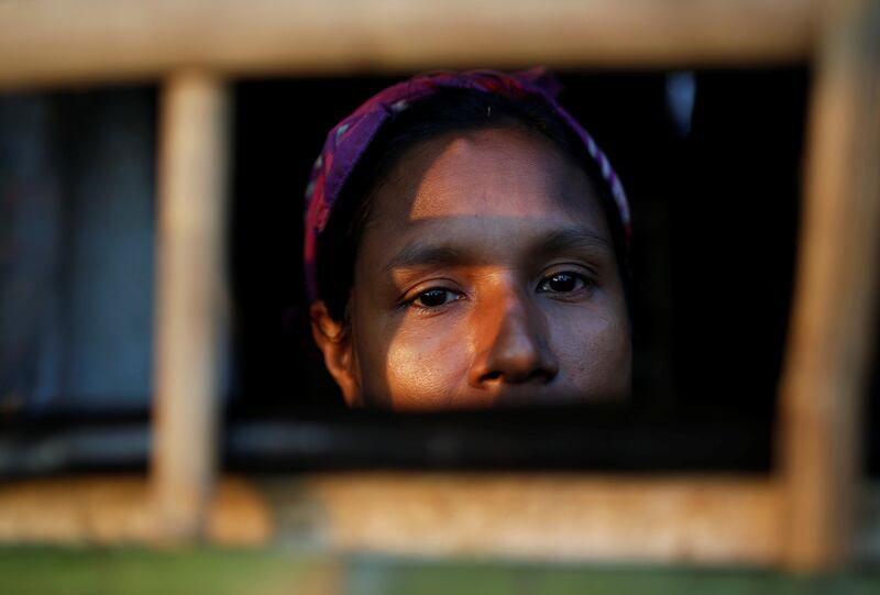 A Rohingya refugee looks out from a shelter at Kutupalong refugee camp near Cox's Bazar, Bangladesh. Adnan Abidi / Reuters