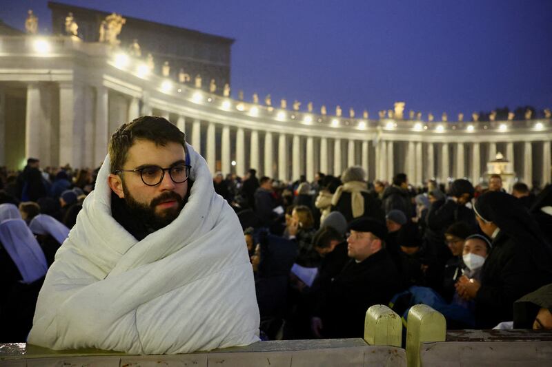 Mourners wait to enter St Peter's Square on the day of the funeral. Reuters