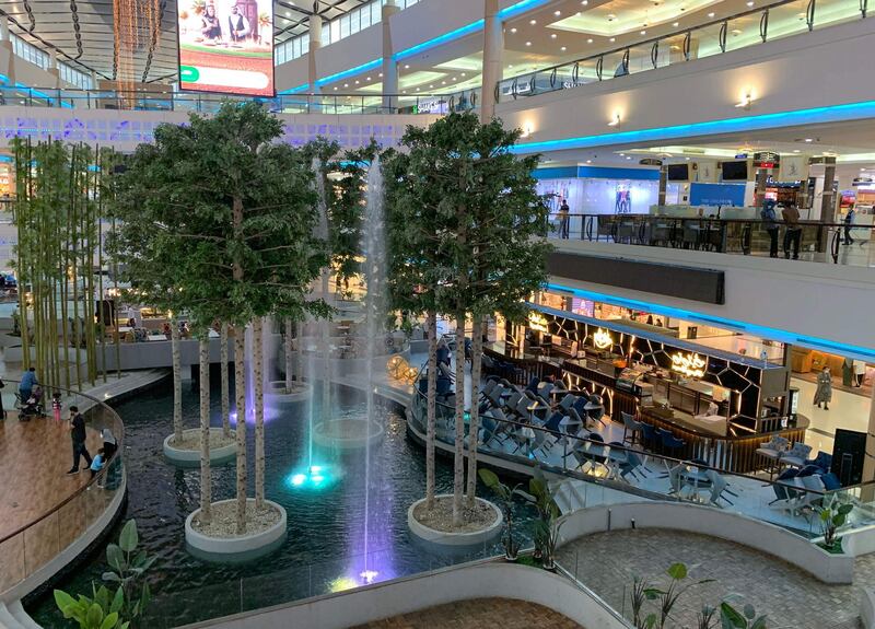 Chairs remain leaning against tables at the closed food court of a mall in the Saudi Arabian capital Riyadh. AFP