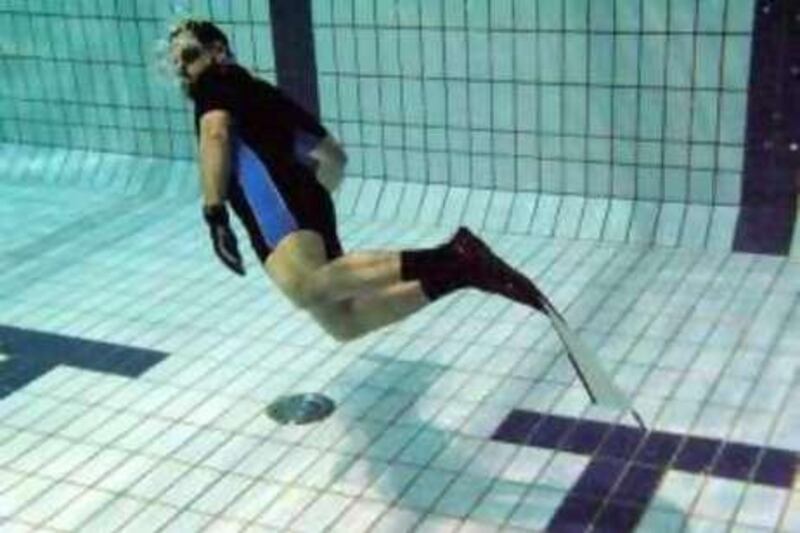 ABU DHABI, UNITED ARAB EMIRATES - MARCH 12, 2008: EMERETIE AND ABU DHABI RESIDENT, ADEL ABU HALIQA, IN FREEDIVING CLASS AT THE ARMED FORCES OFFICERS CLUB IN ABU DHABI. LAUREN LANCASTER/THE NATION