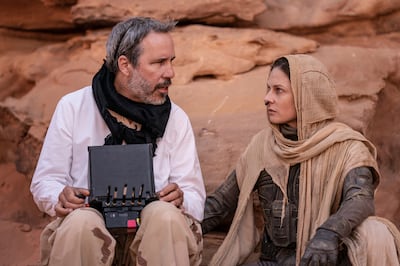 Villeneuve, left, with actor Rebecca Ferguson on the set in the Liwa desert. Photo: Warner Bros Pictures
