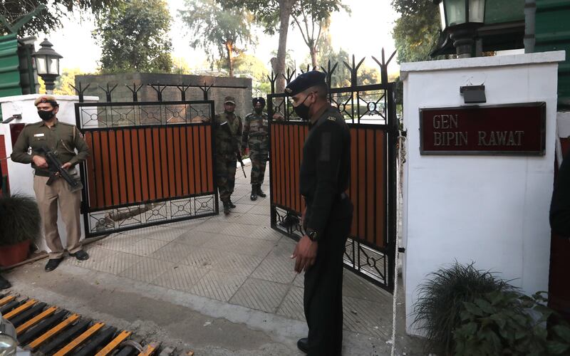 Security outside the Chief of Defence Staff Gen Bipin Rawat's residence in New Delhi, India.  The Indian Air Force said Gen Rawat, his wife Madhulika Rawat and 11 others on board died in the accident. EPA