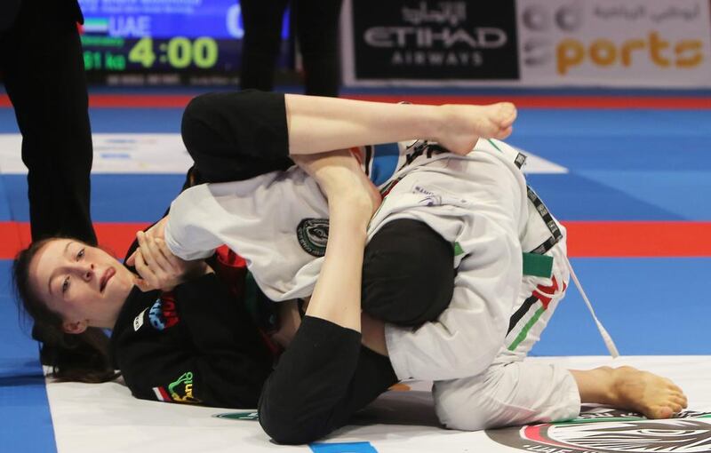 Mahra Al Hinaai, right, of the UAE shown in her match with Aneta Pokarna of the Czech Republic in the Abu Dhabi World Youth Jiu-Jitsu Championship 2016. Ravindranath / The National