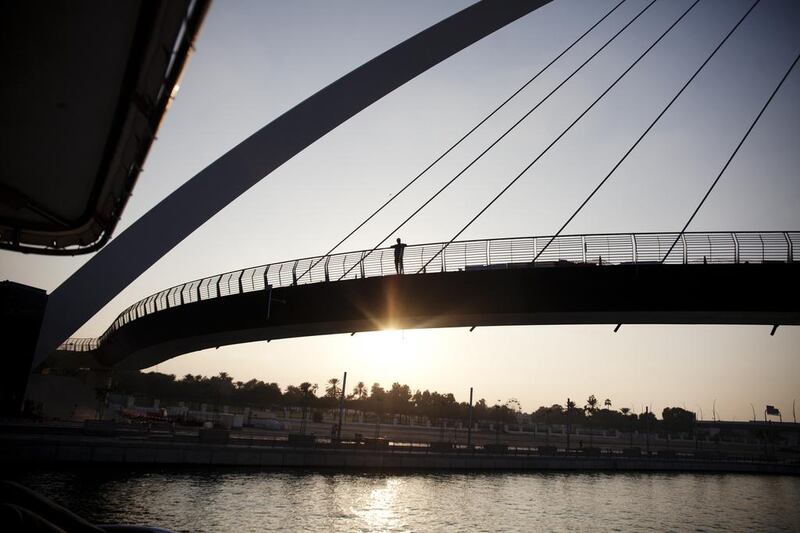 Sunset cruising along the new Dubai Canal in a Gulf Craft luxury yacht. Courtesy Anna Nielsen for The National