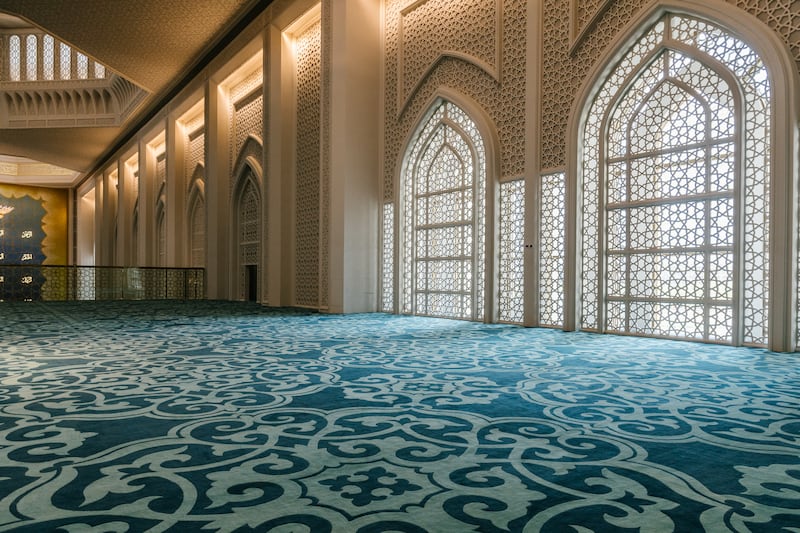Hands completed the installation of the massive carpet only a few days before the mosque opened to the public in August this year. Supplied
