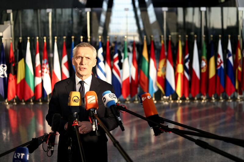 Nato Secretary General Jens Stoltenberg speaks to the press as he arrives for a two-day defence ministers' meeting in Brussels. AFP