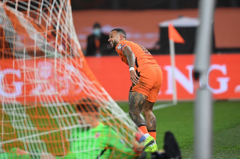 Netherlands forward Memphis Depay celebrates scoring, AFP