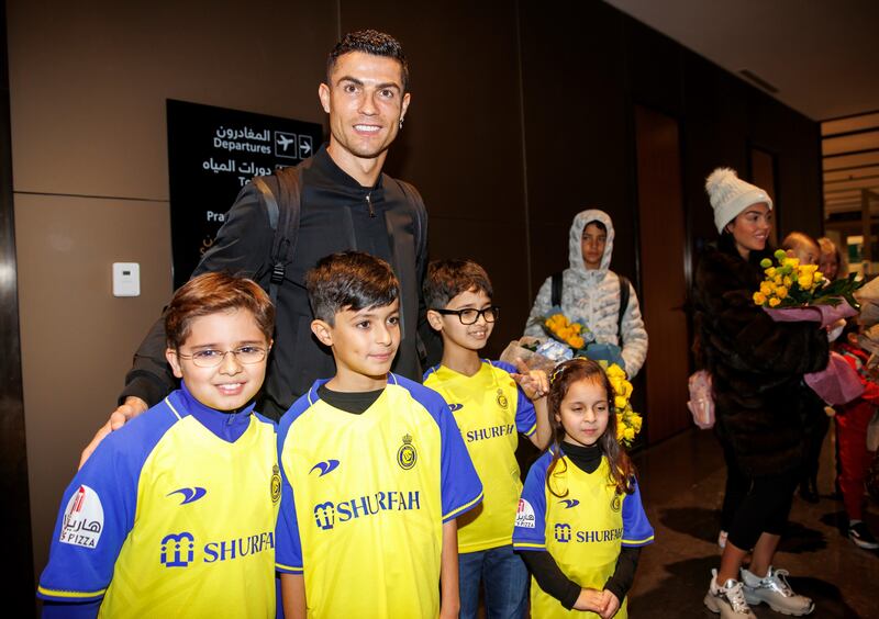 Cristiano Ronaldo is greeted by young supporters after arriving in Riyadh ahead of his medical with Al Nassr. Photo: Al Nassr