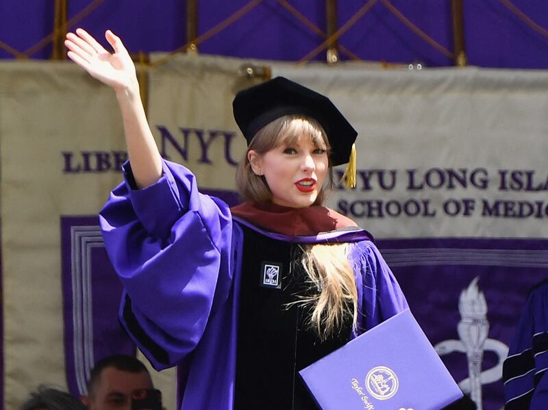 Singer Taylor Swift receives an honorary doctorate of fine arts during New York University's commencement ceremony for the class of 2022 at Yankee Stadium in New York City on May 18, 2022. AFP
