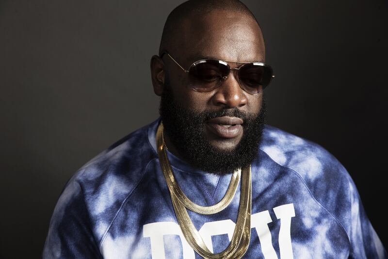 Rick Ross scored his first hit with the single Hustlin’ in 2006, and has gone on to clock up five US number one albums. AP