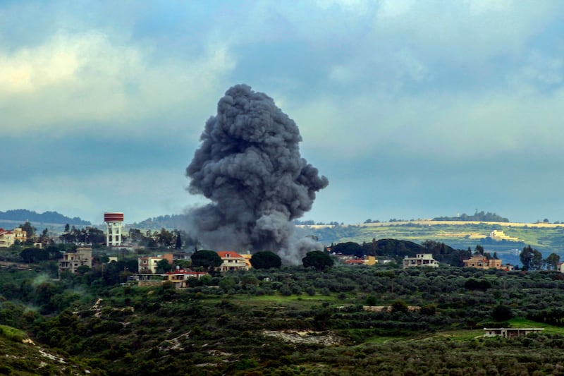 Smoke billows after an Israeli strike on the Lebanese border village of Tayr Harfa, amid cross-border tensions as fighting continues between Israel and Hamas militants in Gaza.  AFP