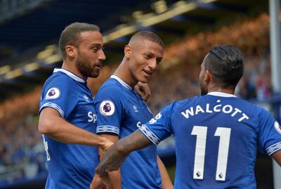 Soccer Football - Premier League - Everton v Southampton - Goodison Park, Liverpool, Britain - August 18, 2018   Everton's Richarlison celebrates scoring their second goal with Theo Walcott and Cenk Tosun    REUTERS/Peter Powell    EDITORIAL USE ONLY. No use with unauthorized audio, video, data, fixture lists, club/league logos or "live" services. Online in-match use limited to 75 images, no video emulation. No use in betting, games or single club/league/player publications.  Please contact your account representative for further details.