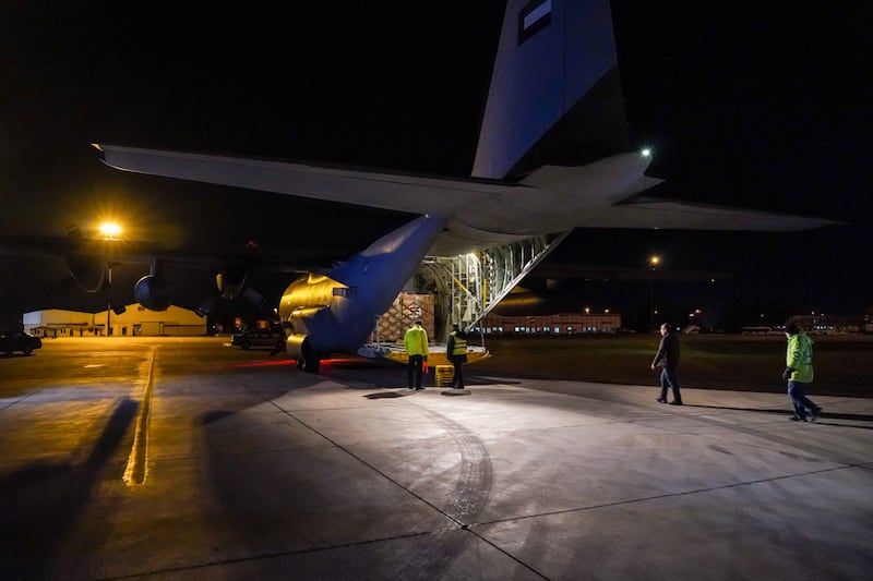 The aid flight being unloaded after landing in Damascus. All photos: Mahmoud Rida / The National