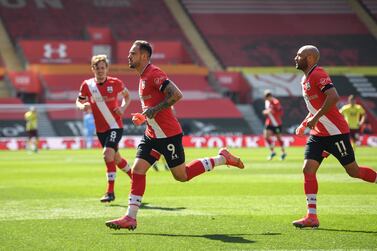 epa09115165 Danny Ings (C) of Southampton celebrates after scoring a goal during the English Premier League soccer match between Southampton FC and Burnley FC in Southampton, Britain, 04 April 2021. EPA/Glyn Kirk/ POOL EDITORIAL USE ONLY. No use with unauthorized audio, video, data, fixture lists, club/league logos or 'live' services. Online in-match use limited to 120 images, no video emulation. No use in betting, games or single club/league/player publications.