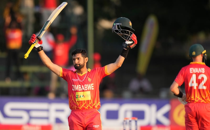 Zimbabwe batsman Sikandar Raza celebrates after scoring a century in an ODI against India in Harare on August 22, 2022. AP