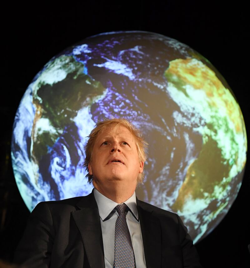 Mr Johnson attends the launch of the UK-hosted COP26 Summit at the Science Museum in London, in February 2020. Getty Images