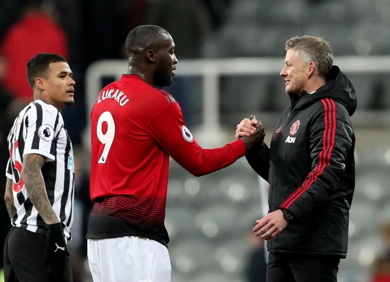 Ole Gunnar Solskjaer shakes hands with Romelu Lukaku at the end of the match. Reuters