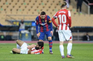 Barcelona's Argentinian forward Lionel Messi checks on Athletic Bilbao's Spanish forward Asier Villalibre. AFP