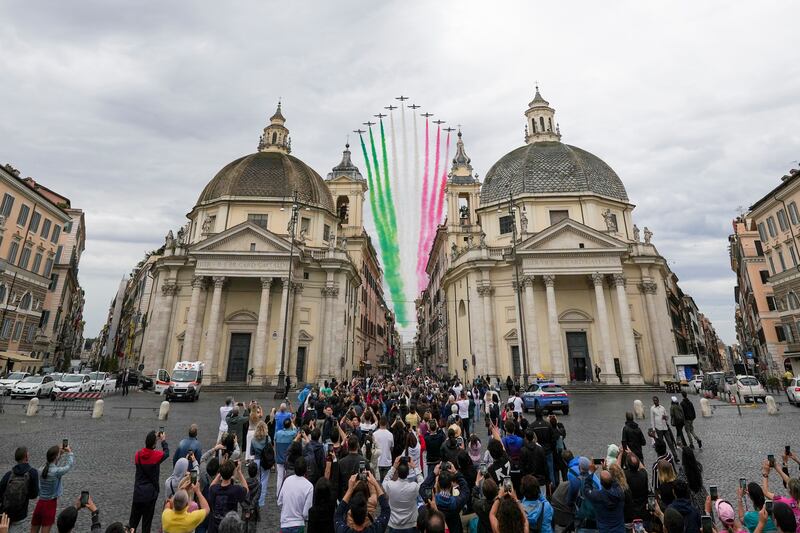 Italian aerobatic squad 'Frecce Tricolori' flies over Rome as part of the celebrations for Italy's Republic Day, in Rome. AP