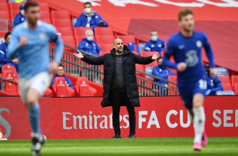 Manchester City manager Pep Guardiola gestures during the game. AP