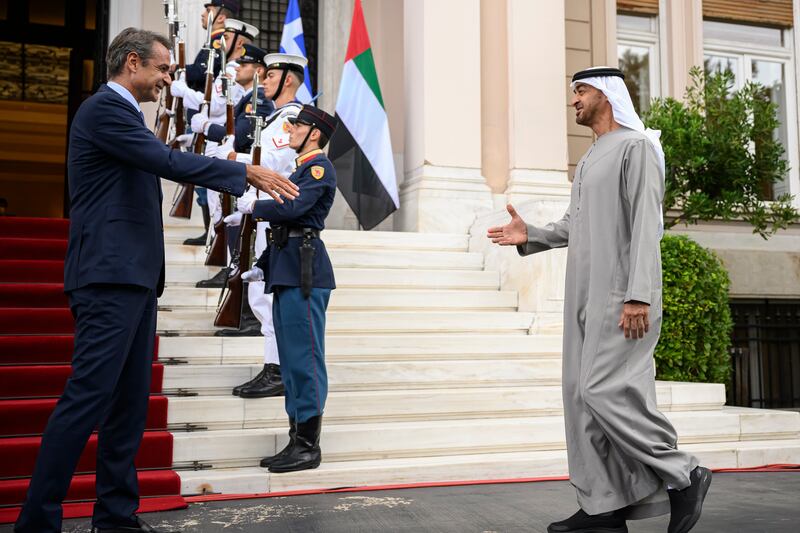 President Sheikh Mohamed is received by Mr Mitsotakis at the Maximos Mansion.