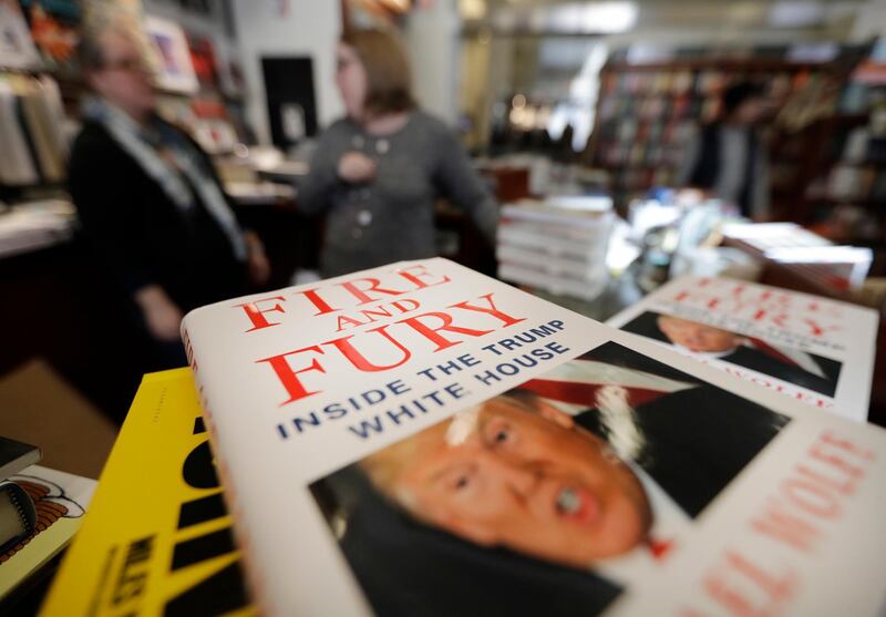 Copies of the book "Fire and Fury: Inside the Trump White House" by Michael Wolff are displayed at Barbara's Books Store, Friday, Jan. 5, 2018, in Chicago. (AP Photo/Charles Rex Arbogast)