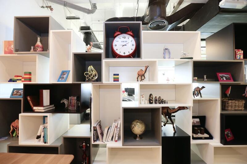 A variety of trinkets decorate the library shelves at the Google office in Dubai Media City. Sarah Dea / The National