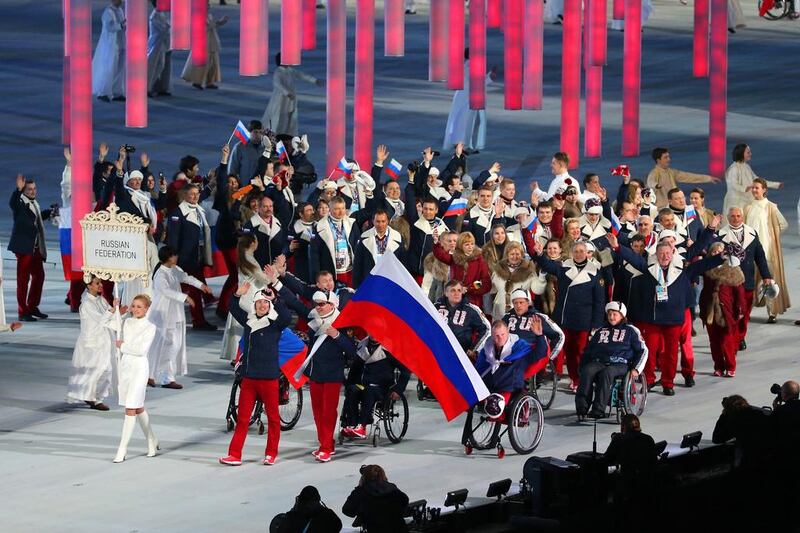 Russia enter the arena lead by flag bearer Valerii Redkozubov during the Opening Ceremony of the Sochi 2014 Paralympic Winter Games at Fisht Olympic Stadium on Friday. Ian Walton / Getty Images / March 7, 2014