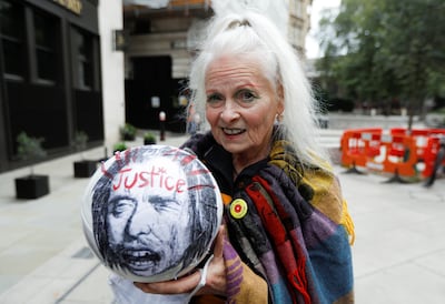 Vivienne Westwood holds a ball with a word "justice" written on it outside the Old Bailey, the Central Criminal Court ahead of a hearing to decide whether Assange should be extradited to the United States. 
Reuters.
