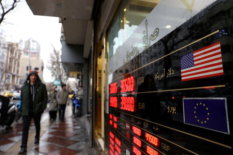 A board shows currency exchange rates in Tehran, Iran. Reuters