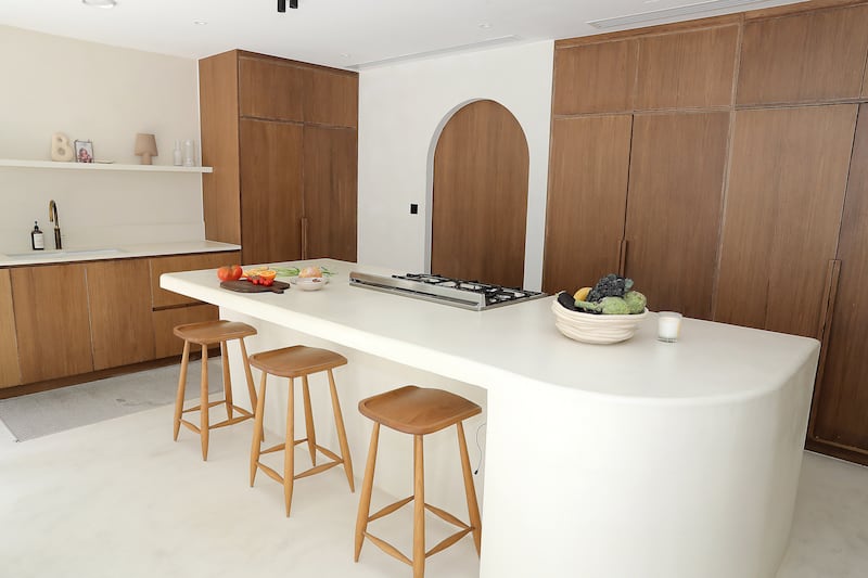 The kitchen. The couple reconfigured the villa's ground floor and extended the kitchen to double its size