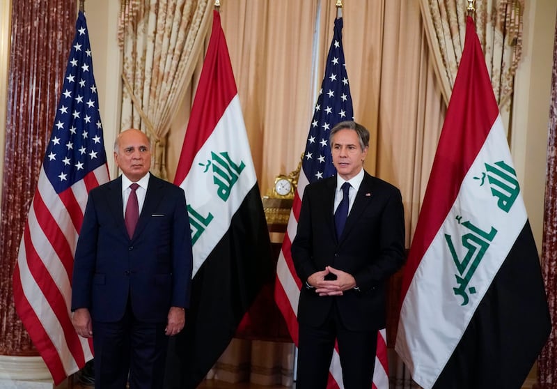 Iraq's Foreign Minister Fuad Hussein, left, and US Secretary of State Antony Blinken in Washington in 2021. AP