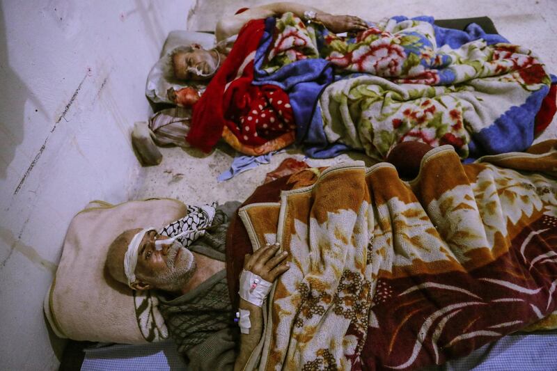 Injured people receive medical attention inside a hospital after bombs fell on rebel-held Douma, Eastern Ghouta. Mohammed Badra / EPA