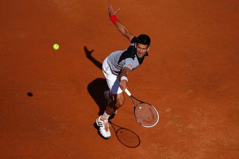 Novak Djokovic moves on at the Rome Open but his thoughts are on the flooding in his native Serbia.  Julian Finney / Getty Images