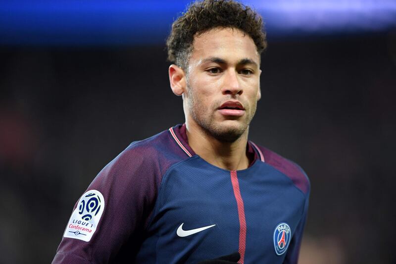 (FILES) In this file photo taken on February 17, 2018 Paris Saint-Germain's Brazilian forward Neymar Jr looks on during the French Ligue 1 football match between Paris Saint-Germain (PSG) and Strasbourg at The Parc des Princes in Paris.
On February 28, 2018 Paris Saint-Germain said Brazilian superstar Neymar, the world's most expensive footballer, will undergo surgery on his foot and ankle injury in Brazil at the end of the week. / AFP PHOTO / CHRISTOPHE ARCHAMBAULT