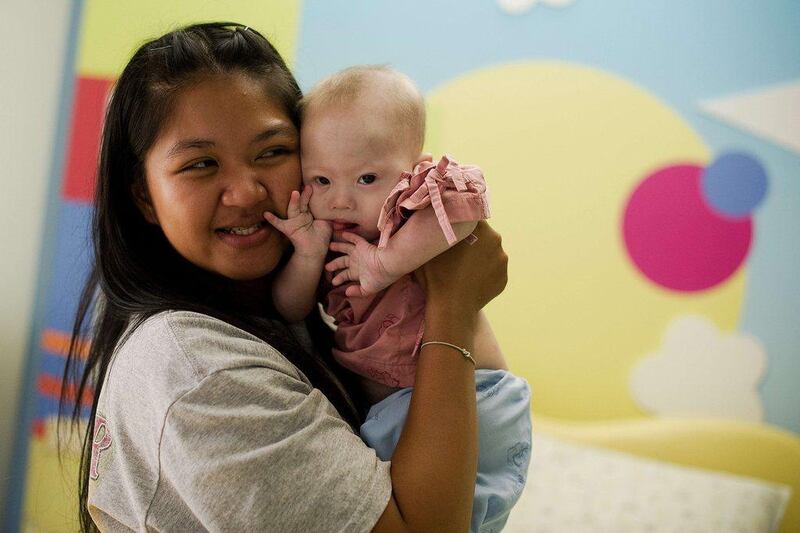 Pattaramon Chanbua, the 21-year-old Thai surrogate mother, holds Gammy, born with Down syndrome, at the Samitivej hospital, Sriracha district. An Australian minister said Gammy might be entitled to Australian citizenship Nicolas Asfouri / AFP Photo 