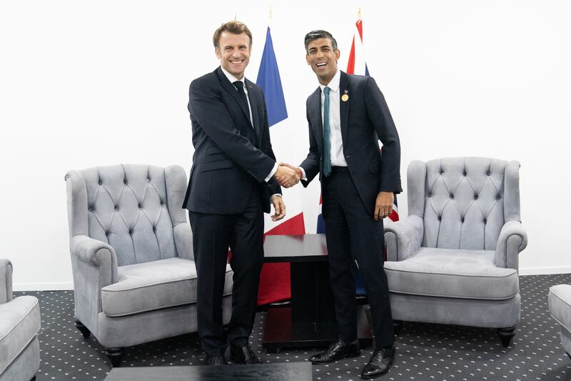 Rishi Sunak (R) with Emmanuel Macron in Egypt in November. They will meet again in Paris on Friday. PA