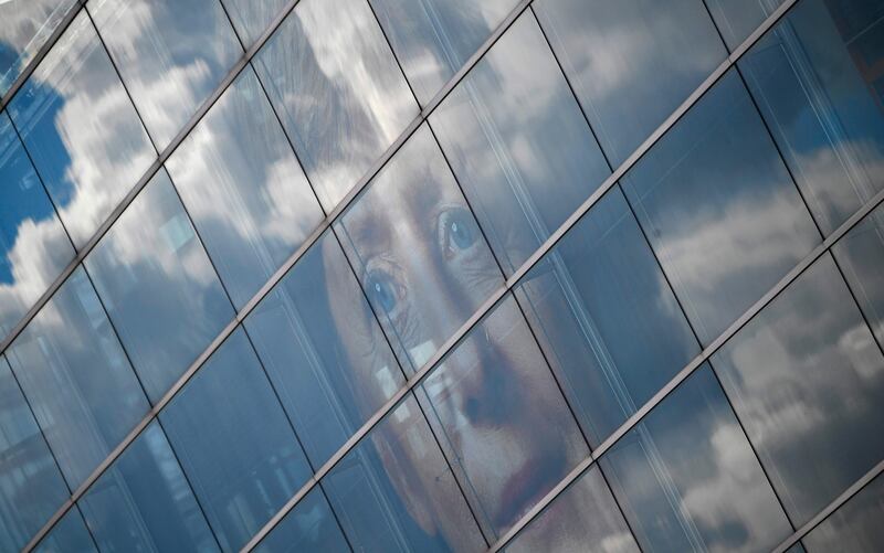 Clouds are reflected at the party headquarters of German Chancellor Angela Merkel's Christian Democratic Union party (CDU) in Berlin on September 19, 2017, 5 days before Germans head to the polls.
Germany goes to the polls for parliamentary elections on September 24, 2017. / AFP PHOTO / Tobias SCHWARZ