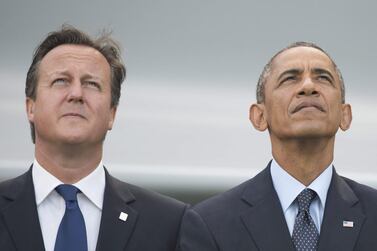 The British prime minister David Cameron and US president Barack Obama watch a NATO flypast in 2014. EPA