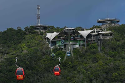 SkyCab cable cars in Langkawi. The holiday island reopened to domestic tourists in September and is now set to welcome international visitors. AFP