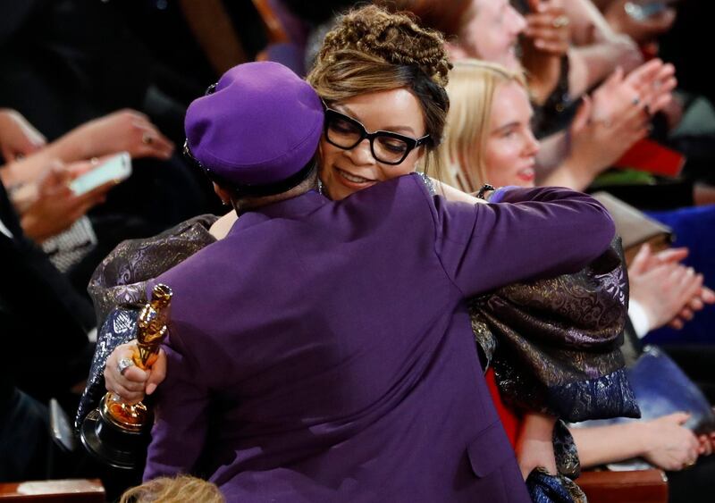 Ruth E. Carter, who won the costume Oscar for Black Panther, celebrates with Spike Lee. When she won the award she thanked Lee for giving her her start. Photo: Reuters