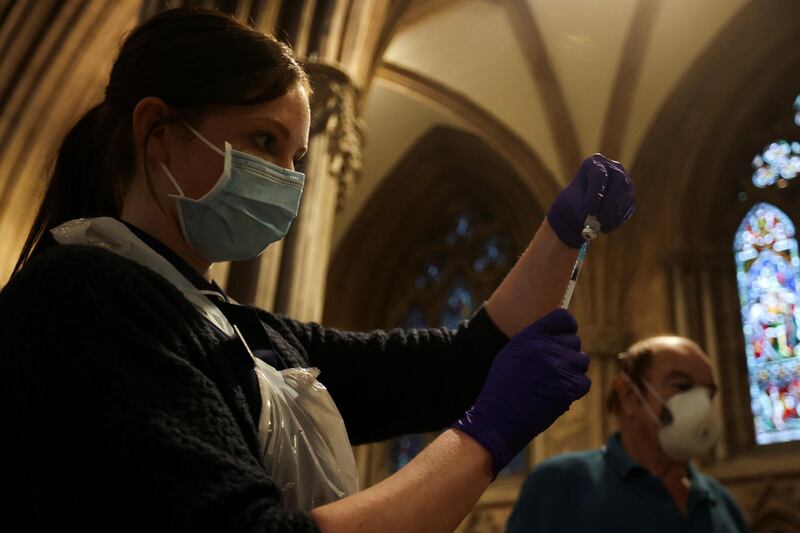 A healthcare worker prepares a Covid-19 vaccine inside Lichfield Cathedral, which had been turned into an emergency vaccination centre amid the coronavirus disease outbreak, January 15, 2021. File photo / Reuters