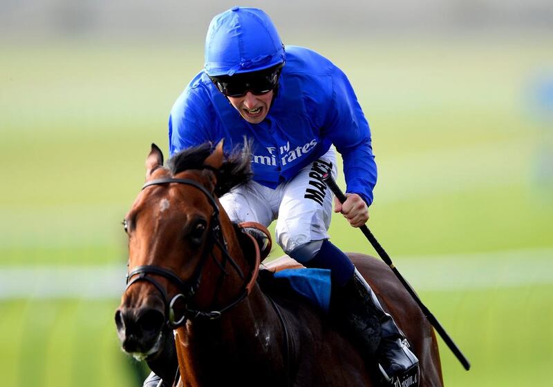 William Buick celebrates victory after riding Charming Thought to win Middle Park Stakes at Newmarket. Alan Crowhurst / Getty Images