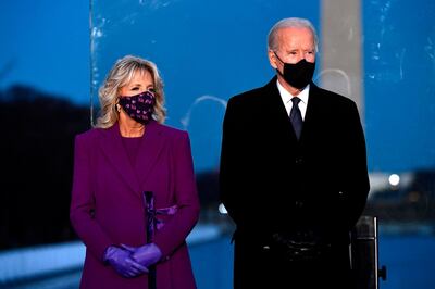 US President-elect Joe Biden and wife Dr. Jill Biden attend a Covid-19 Memorial at the Lincoln Memorial in Washington, DC, on January 19, 2021 to honor the lives of those lost to Covid-19. (Photo by Patrick T. FALLON / AFP) (Photo by PATRICK T. FALLON/AFP via Getty Images)