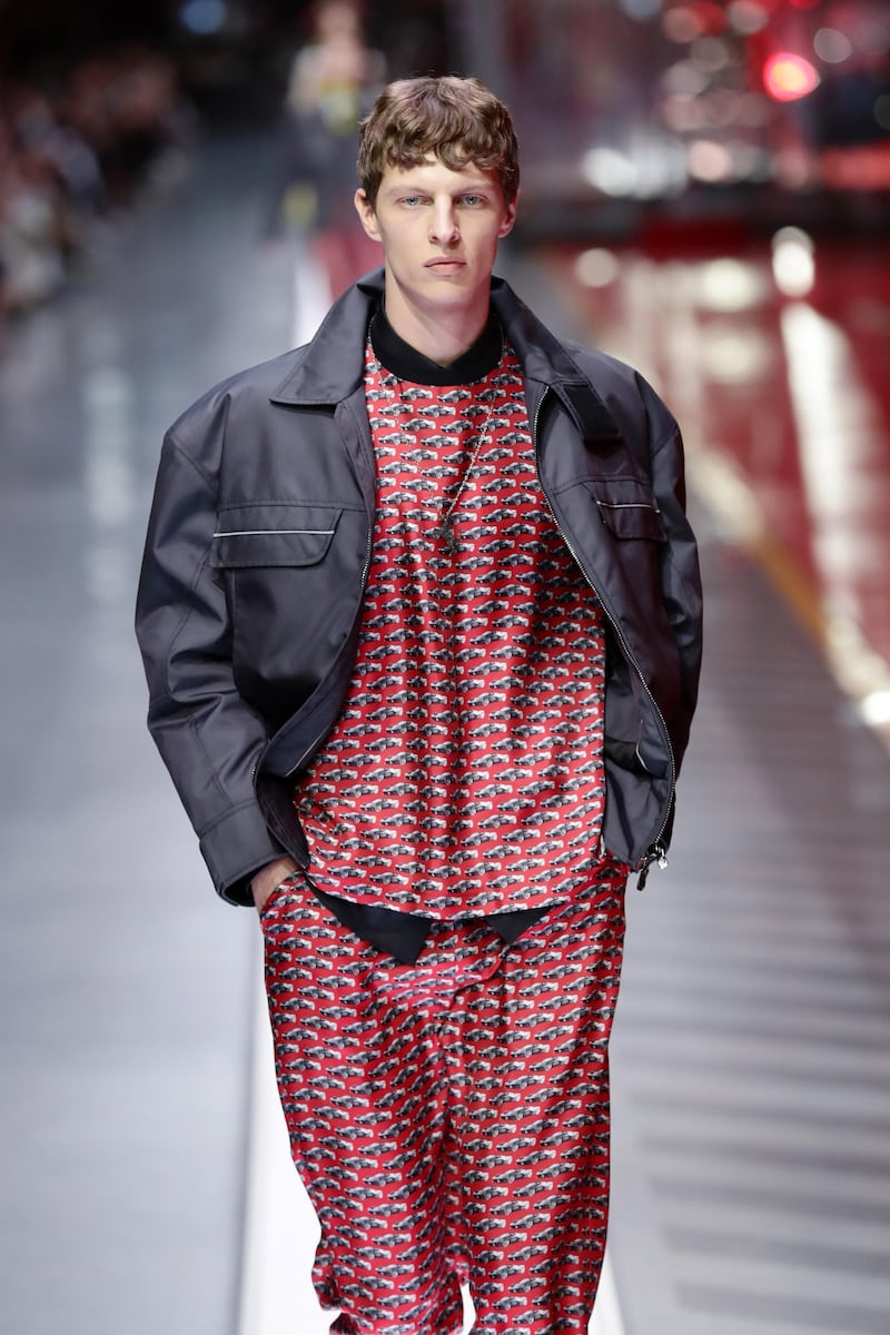 A model walks the runway at the fashion debut of the first co-ed Ferrari collection at Ferrari Factory on June 13, 2021 in Maranello, Italy. Getty Images