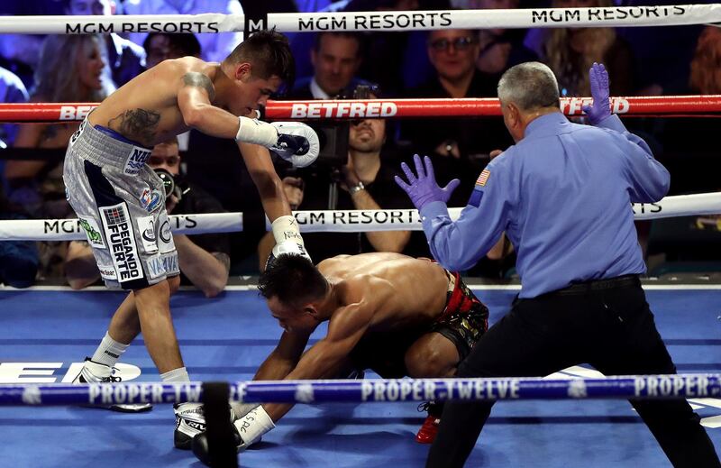 Emanuel Navarette (left) and Jeo Santasima during the World Boxing Organisation World Super Bantam Title bout at the MGM Grand, Las Vegas.  PA wire