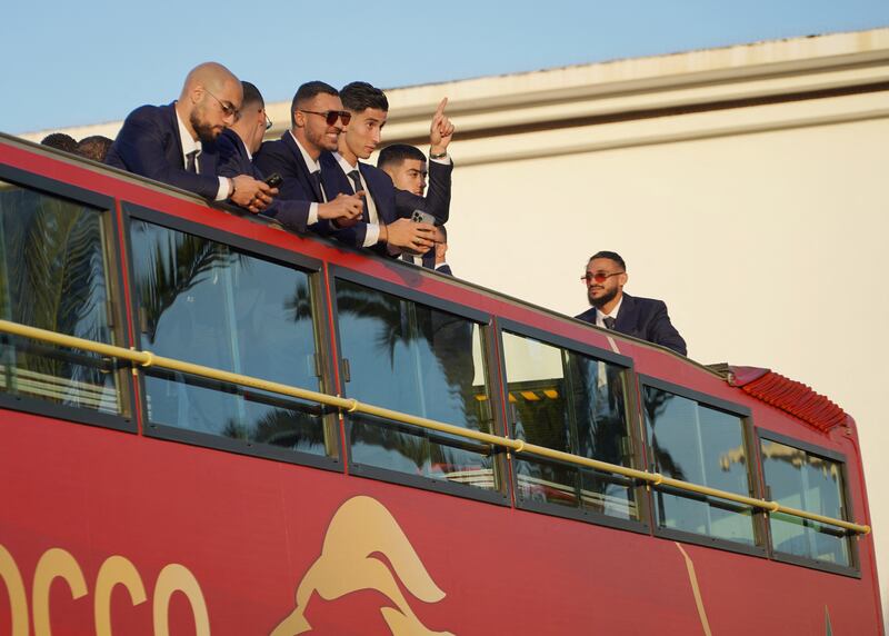 Morocco players on the bus before the start of the parade. Reuters